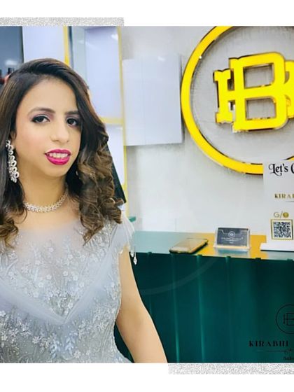 This client is glowing after her party makeover. We gave her soft, bouncy curls and a makeup look that highlights her beautiful features.