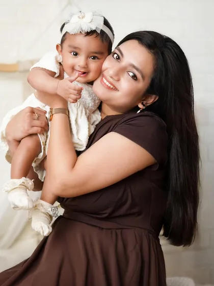 Where the lens meets love. This tender moment between a mother and her baby is what family photography is all about, creating heirlooms from moments.