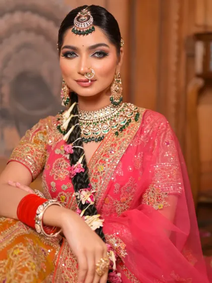 A full-face portrait that captures the striking beauty of this bridal look. The makeup is perfectly balanced, with bold eyes and a soft, neutral lip.