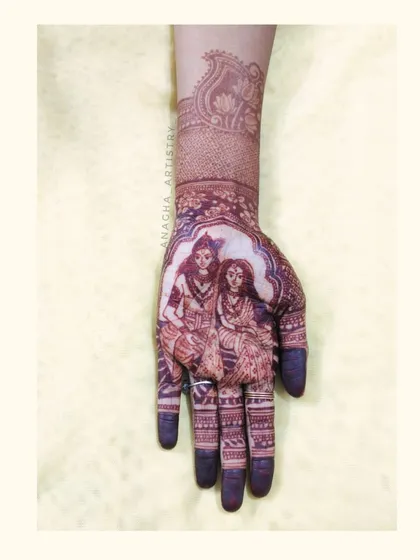 The stain of the Radha-Krishna portrait after a few hours. The color is beginning to develop into a rich orange-brown, and the fine details are becoming more prominent.