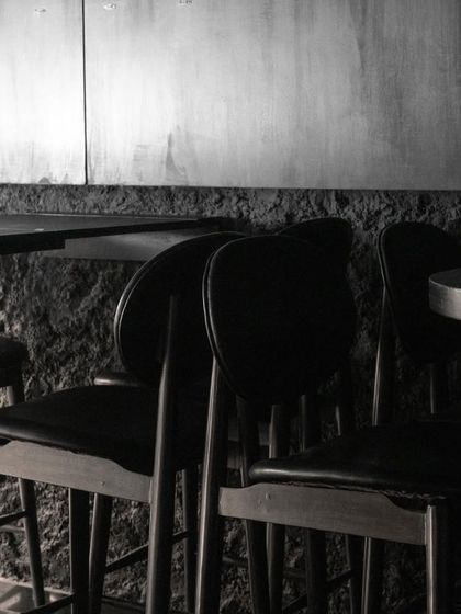 A monochromatic getaway with the choicest flavors made to last. The clean lines of our bar stools against the textured wall is a signature look at Lair.