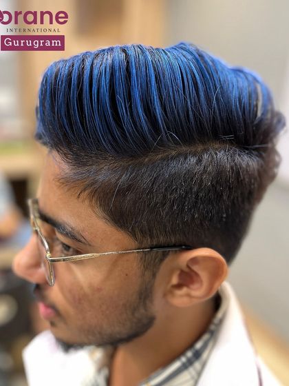Another angle of the vibrant blue hair color. I teach students how to achieve clean, saturated results even with unconventional fashion colors.