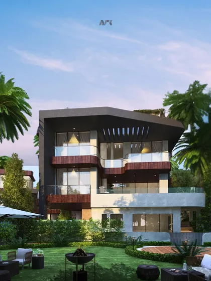 A view of a villa's private garden and pool area at Evara. The design emphasizes outdoor living, with seamless transitions from the interior spaces to the beautifully landscaped exterior.