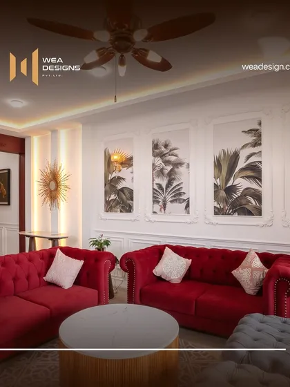 A close-up of the vibrant red Chesterfield sofa, set against a backdrop of botanical art within classic wall panels. This shows our ability to integrate bold colors into a sophisticated design.