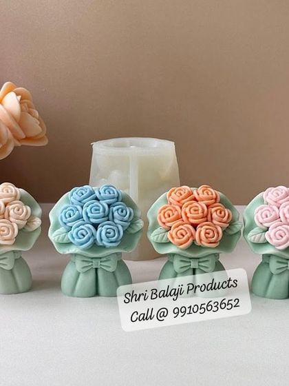 A set of four rose bouquet soaps or candles in different pastel colors. This image shows how you can use my bouquet mold to create a colorful and charming collection.