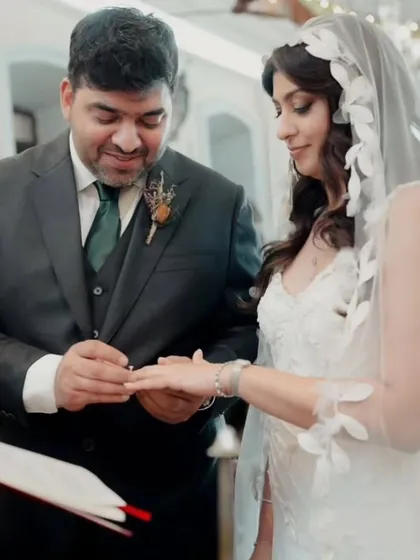 A collection of memories from a beautiful Catholic wedding in Goa. The bride's hair is styled in soft waves under her veil, and her makeup is natural and glowing, capturing her joyful and candid moments perfectly.