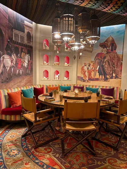 The interiors at Loya are fit for royalty, with stunning murals and luxurious furnishings. I capture the ambiance to show that a meal here is not just about food, but a complete cultural immersion.