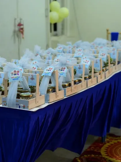 A long table displaying all the thoughtfully prepared party favors for the guests.