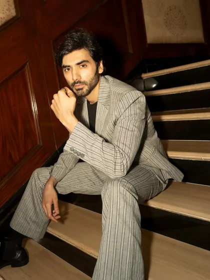 Another seated portrait of Ishwak Singh for GQ, this time with a more direct and engaging look towards the camera.