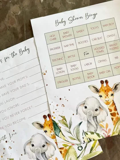 Custom stationery for a 'Wildest Adventure' themed baby shower, including 'Wishes for the Baby' cards and 'Baby Shower Bingo' games.