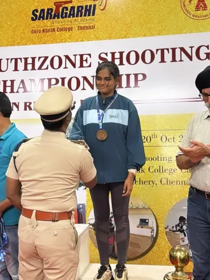 Jovitha M receiving her bronze medal at the South Zone Championships in Chennai, a significant achievement at a major regional competition.