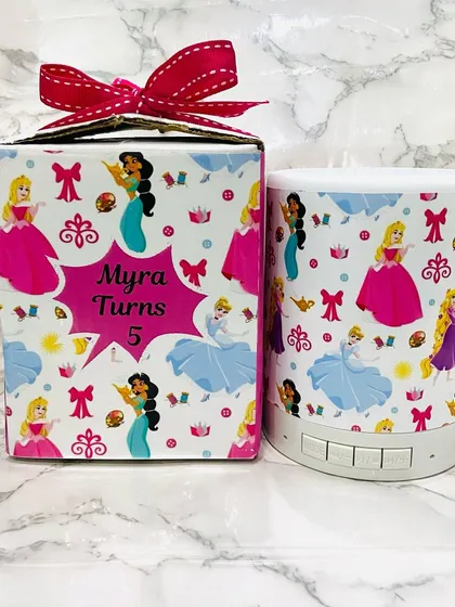A personalised princess speaker shown with its custom gift box. It's a complete gift solution for a themed birthday party.