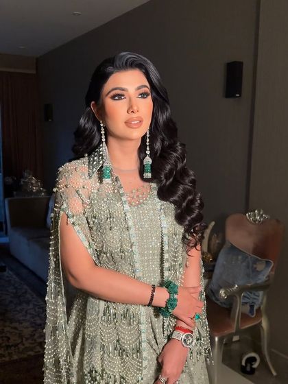 Sometimes, the most elegant look is letting your hair down. These soft, open waves are effortlessly beautiful.