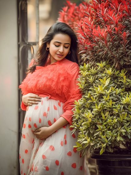In the garden of life, she's growing her sweetest bloom. This outdoor portrait is a whisper of a million beautiful tomorrows.