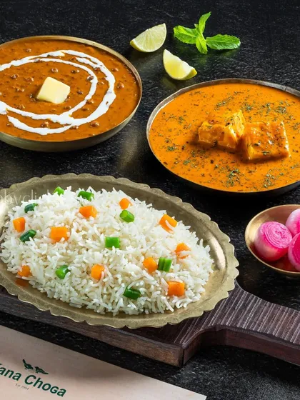 A simple yet classic meal of Dal Makhani, Paneer Makhani, and rice, shot for Dana Choga.