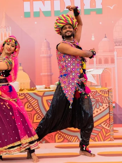 Celebrating India in our 'World Tour' carnival. This performance featured dancers in colorful traditional Indian outfits, showcasing the energy and vibrancy of our own culture with a spirited dance.