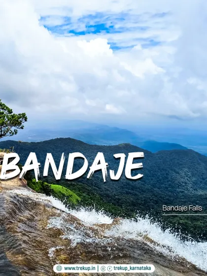 The view from the top of Bandaje falls, where the water rushes over the cliff edge into the valley below.