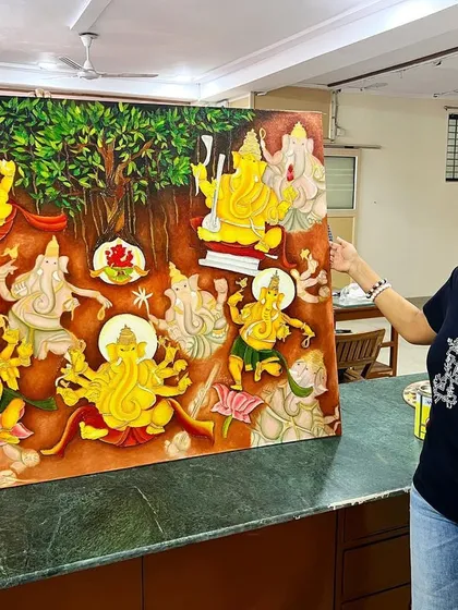 Another angle of Pooja with her magnificent Ganesha oil painting. We support our students through long-term projects, helping them bring their ambitious ideas to life.