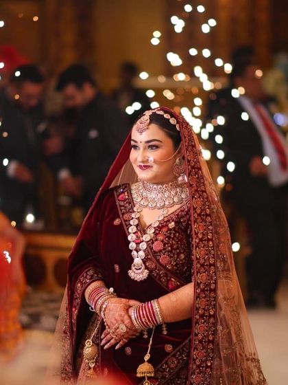 A magical entry shot of my bride Disha. The sparklers and her beautiful smile light up the frame.