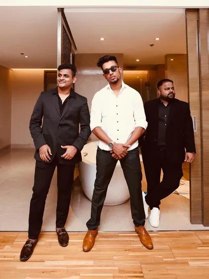 My team and I, looking sharp and ready before a wedding performance. We bring a professional and coordinated presence to every event we do.