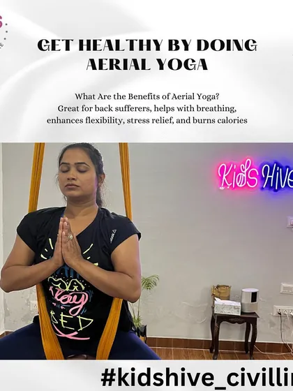 This image highlights the core benefits of aerial yoga, including stress relief, enhanced flexibility, and calorie burn. A member is seen in a meditative pose, suspended in the yoga hammock, showcasing the calm and focus this practice brings.