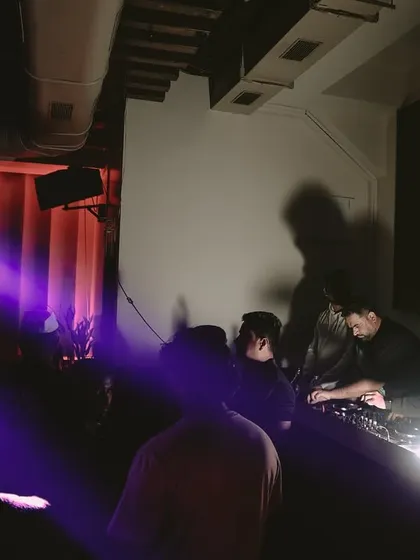 The purple haze of the laser lights hitting the crowd. I use lighting to build the atmosphere and create a club-like feel.