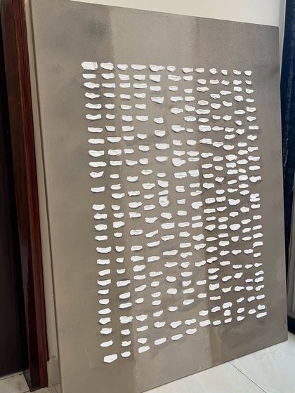 A 3ft x 4ft textured piece for the Sidewalk cafe in Agra. This one features a pattern of white textured dashes on a solid grey background.