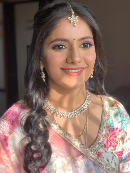 A close up of Manisha's Haldi look, showing the flawless, sun kissed skin.