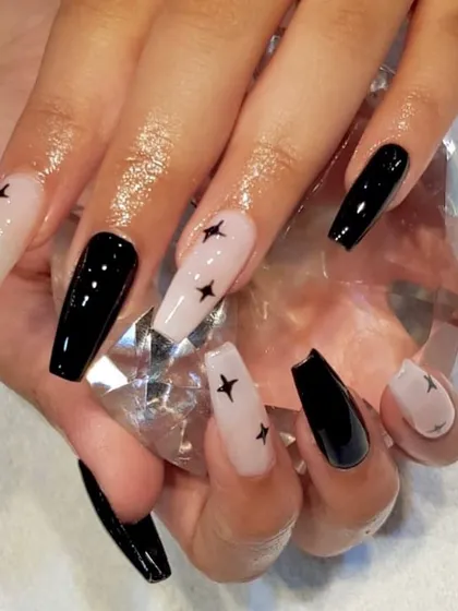 From a Pinterest pin to perfectly polished nails. A client wanted these cool, coffin-shaped nails with alternating black and sheer nude with black stars, and I delivered the look.