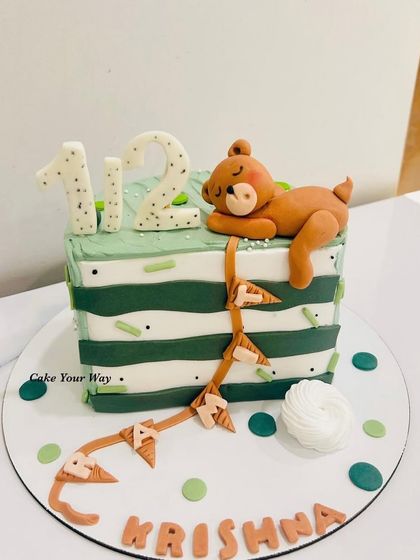 Six months of snuggles and cake. A bear-y special creation for a half birthday.