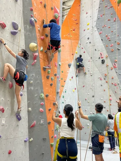 The community is what makes climbing special. Here, climbers and belayers work together, offering encouragement and ensuring a safe climb for everyone.