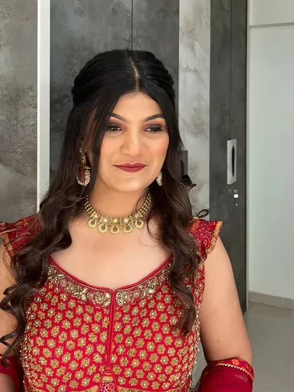 A more pensive look, showing the versatility of the makeup. It looks beautiful whether smiling or in a quiet moment.