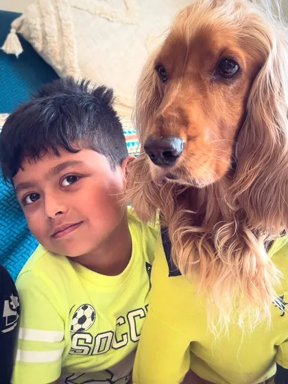 A precious memory with cousins. Posto and his human cousin sharing a quiet moment.