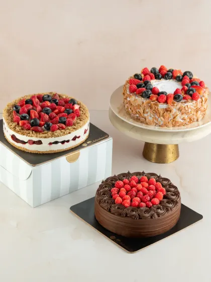 A trio of our beautiful berry cakes. You can see the Raspberry Chocolate cake, the Mixed Berry Cheesecake, and the Mixed Berry Gateau with toasted almonds.