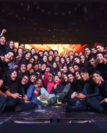 The whole crew celebrating with Ranveer Singh after a successful Filmfare performance. His energy is truly unmatched.
