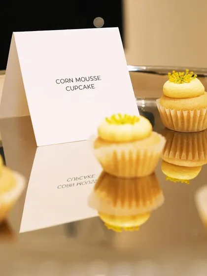 Miniature corn mousse cupcakes served for Versace. These savory bites are another example of how we create a cohesive color story that flows from the clothes to the canapés.