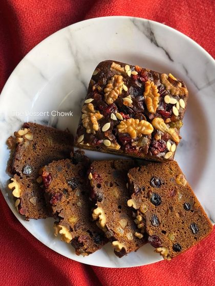 A slice of my improved Christmas Plum Cake. I worked hard to perfect this recipe, and I'm so proud to offer a version that is moist, rich, and delicious.