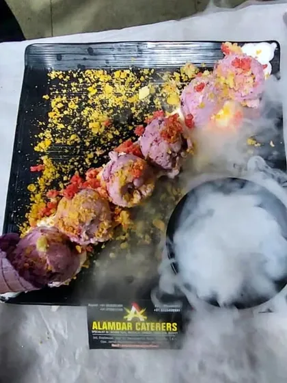 Our special deconstructed ice cream platter, served with dramatic smoke for a fun experience. It is a yummy and playful dessert for all ages.