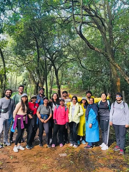 A moment of rest on the trail during our Kurinjal trek, with the forest path showing the start of our adventure.