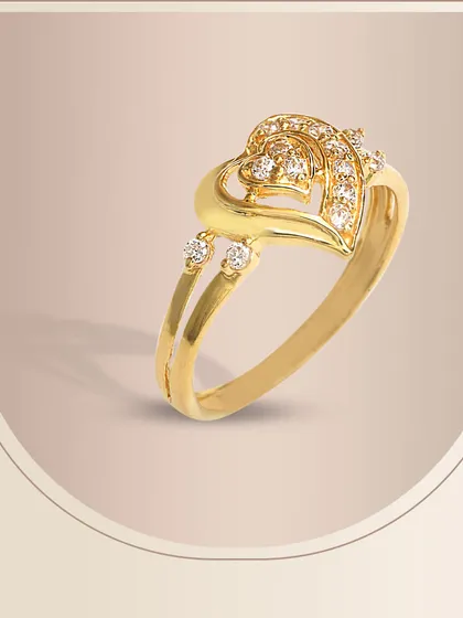 A romantic gold ring featuring two interconnected hearts adorned with diamonds. The split shank adds to its delicate and elegant design, making it a perfect gift of love.