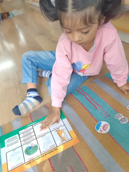 These images show the various activities we did to help children understand the significance of Independence Day, from learning about national symbols to making tricolor art.