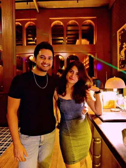 A couple enjoying the sophisticated vibe of 10SpeakEasy.