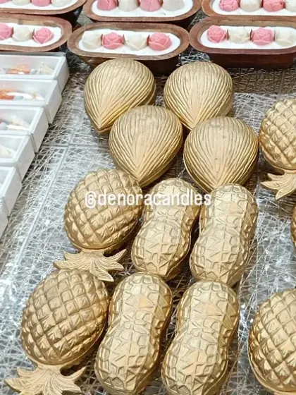 A satisfying view of several orders ready to be dispatched. This image shows a variety of my products, including methai candles and golden pineapple urlis, all packed and waiting to go to their new homes.