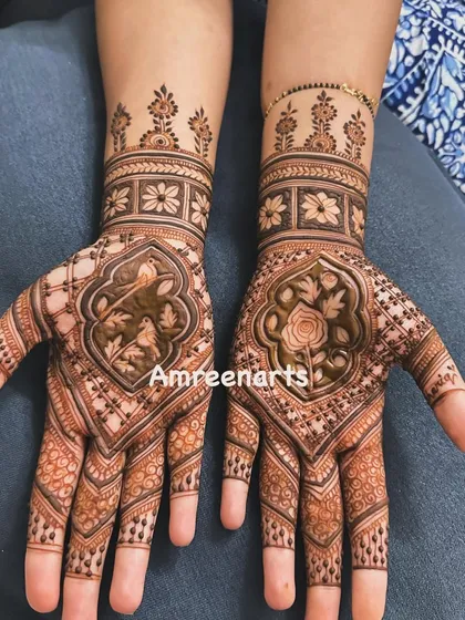 A stunning design with a central rose motif, surrounded by intricate geometric and floral patterns.
