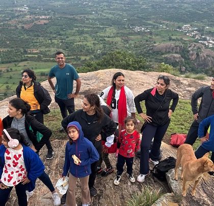 A family group enjoying the views from the top of Kabbaladurga hill.