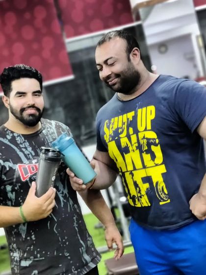 Post-workout cheers with my brother Deven Gahlot. Refueling with a protein shake is a non-negotiable part of my recovery routine.
