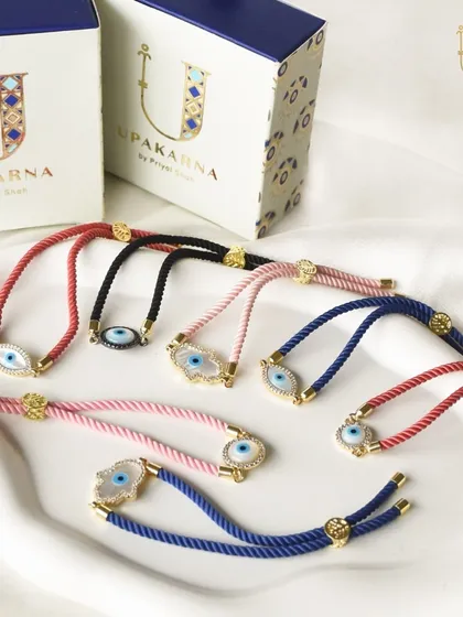 Another look at my evil eye rakhis, beautifully packaged and ready for gifting. It's the perfect way to celebrate the bond of love and protection.
