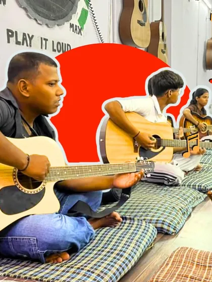 The journey of a musician begins with the first strum. Here, a student in our after-school guitar class is completely focused, learning the chords that will soon become a song. We see not just concentration, but the start of a lifelong passion.