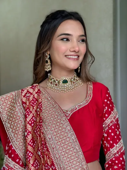 A beautiful smiling portrait of Khush. Her skin looks fresh and dewy, and the makeup enhances her features perfectly.