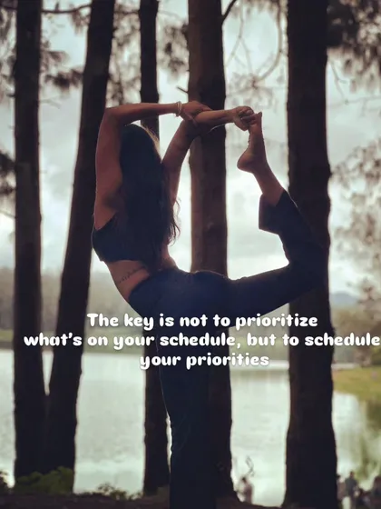 Holding Natarajasana, or Lord of the Dance Pose, in a serene forest setting. This pose is a beautiful expression of balance and reminds us to schedule our priorities, not just prioritize our schedule.